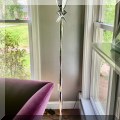 DL02. Chrome colored floor lamp. 